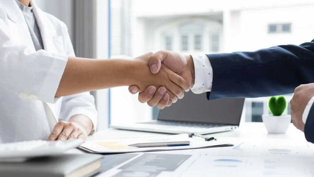 Professional colleagues shaking hands